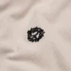 „Peace Wreath“-Polo, cremefarben