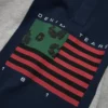 Rugby-Shirt mit Cotton Wreath und panafrikanischer Flagge, grau/marineblau