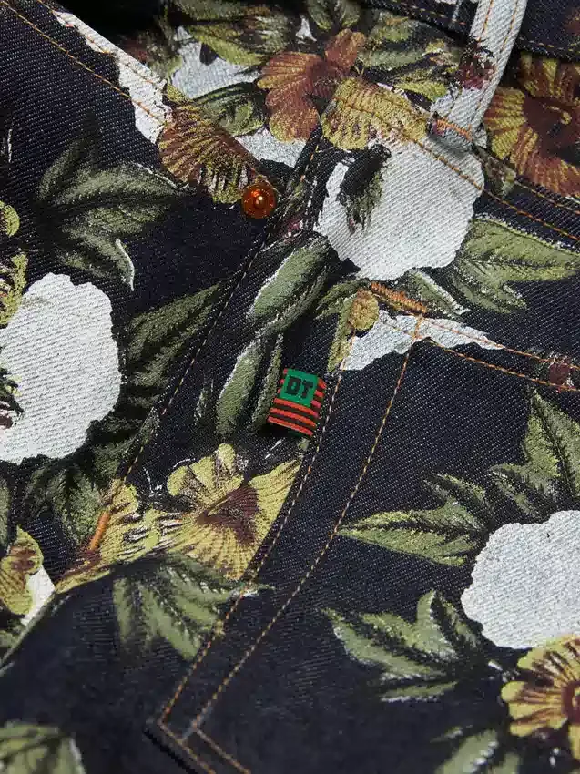 Weite Denim-Hose mit Blumenmuster und Selvedge